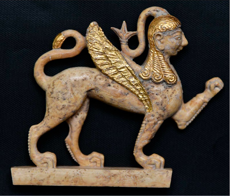 Gilded ivory sphinx discovered in the Mosaic Building (early 6th century BCE). Photo by Ahmet Remzi Erdoğan.